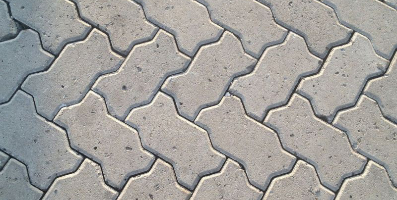 Grey interlocking pavement blocks